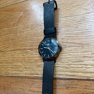 The Horse Watch: Black leather band / tourtise shell trim / black face